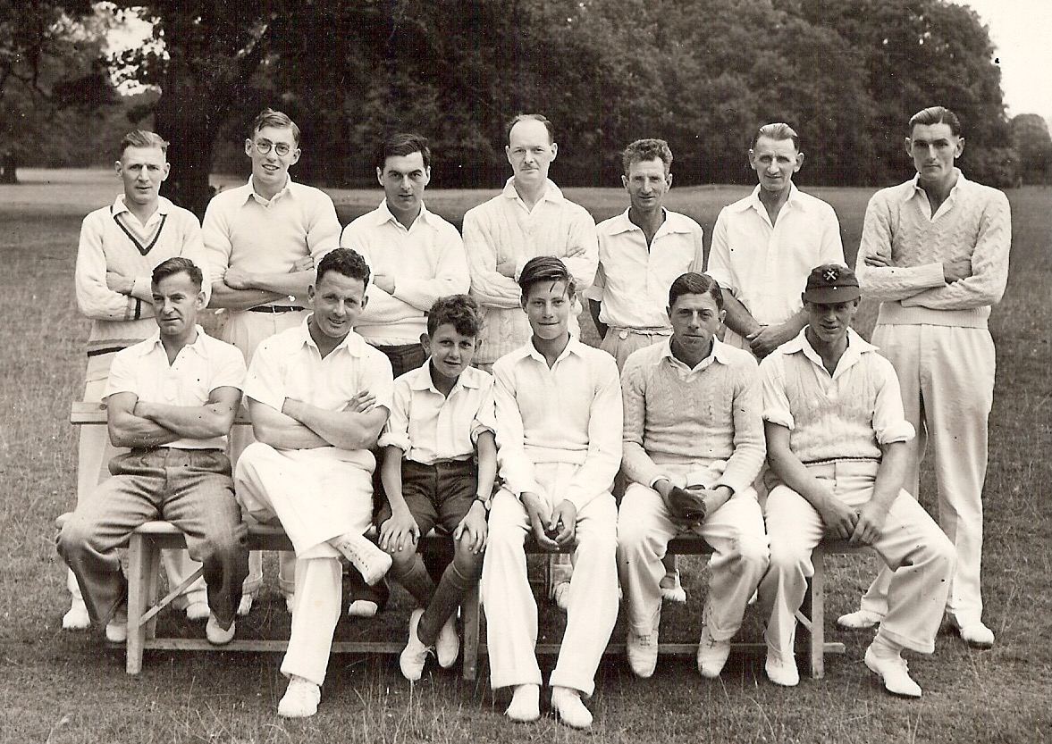 Cavenham cricket team posed in the park, about 1952