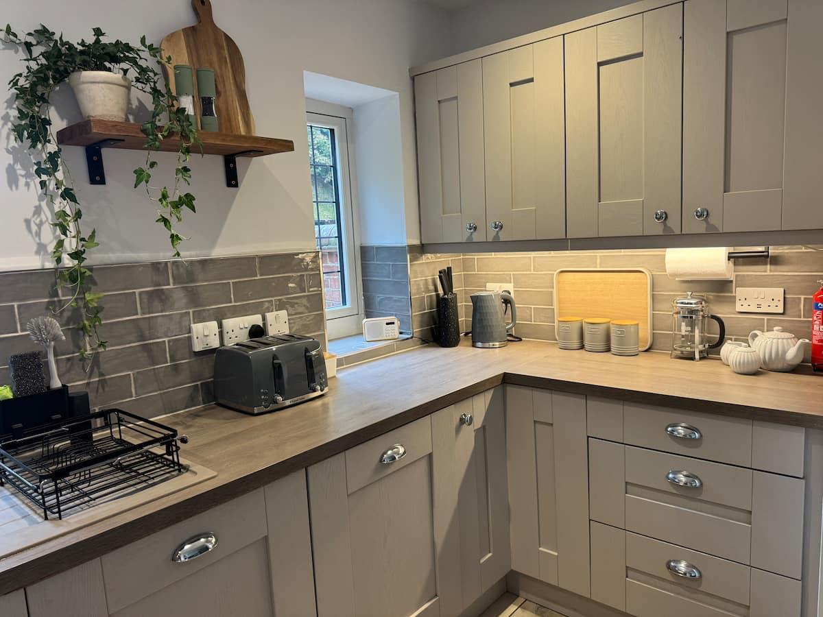 The cottage kitchen, with a window onto the courtyard